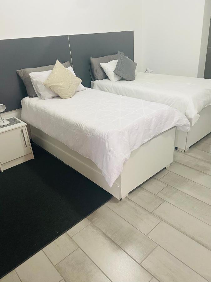 Moh Ville Guest House Масеру Экстерьер фото